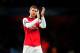 LONDON, ENGLAND - NOVEMBER 26: Per Mertesacker of Arsenal applauds the fans at the final whistle in the UEFA Champions League Group F match between Arsenal and Olympique de Marseille at Emirates Stadium on November 26, 2013 in London, England. (Photo by