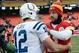 Dec 22, 2013; Kansas City, MO, USA; Kansas City Chiefs quarterback Alex Smith (11) congratulates Indianapolis Colts quarterback Andrew Luck (12) after the game at Arrowhead Stadium. The Colts won 23-7. Mandatory Credit: Denny Medley-USA TODAY Sports