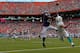 MIAMI GARDENS, FL - OCTOBER 06: Brent Grimes #21 of the Miami Dolphins commits pass interference on Torrey Smith #82 of the Baltimore Ravens during a game at Sun Life Stadium on October 6, 2013 in Miami Gardens, Florida. (Photo by Mike Ehrmann/Getty Ima