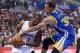 Oct 31, 2013; Los Angeles, CA, USA; Golden State Warriors point guard Stephen Curry (30) fouls Los Angeles Clippers point guard Chris Paul (3) in the first quarter of the game at Staples Center. Mandatory Credit: Jayne Kamin-Oncea-USA TODAY Sports