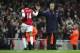 LONDON - JANUARY 02: Thierry Henry of Arsenal celebrates with manager Arsene Wenger as he scores their first goal from the penalty spot during the Barclays Premiership match between Arsenal and Charlton Athletic at the Emirates Stadium on January 2, 2007