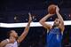 Curry (left) too often sags off dangerous shooters, such as Jose Calderon.