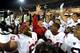 CORVALLIS, OR - NOVEMBER 01: Head coach Ed Orgeron of the USC Trojans celebrates with his team after they beat the Oregon State Beavers at Reser Stadium on November 1, 2013 in Corvallis, Oregon. USC won the game 31-14. (Photo by Steve Dykes/Getty Images)