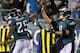 PHILADELPHIA, PA - DECEMBER 22: Running back LeSean McCoy #25 of the Philadelphia Eagles is congratulated by quarterback Nick Foles #9 after scoring a touchdown against the Chicago Bears in during the third quarter of a game at Lincoln Financial Field on