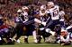 BALTIMORE, MD - DECEMBER 22: Running back LeGarrette Blount #29 of the New England Patriots bounces off of outside linebacker Courtney Upshaw #91 of the Baltimore Ravens to score a touchdown in the first half at M&T Bank Stadium on December 22, 2013 in Ba