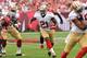 TAMPA, FL - DECEMBER 15: Running back Frank Gore #21 of the San Francisco 49ers rushes upfield against the Tampa Bay Buccaneers December 15, 2013 at Raymond James Stadium in Tampa, Florida. (Photo by Al Messerschmidt/Getty Images)