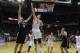HOUSTON, TX - NOVEMBER 29: Tornike Shengelia #20 of the Brooklyn Nets shots the ball against Omer Asik #3 of the Houston Rockets during the game at Toyota Center on November 29, 2013 in Houston, Texas. NOTE TO USER: User expressly acknowledges and agrees