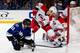 TAMPA, FL - DECEMBER 21: Tom Pyatt #11 of the Tampa Bay Lightning shoots the puck on net against Goalie Justin Peters #35 and Manny Malhotra #22 of the Carolina Hurricanes during the third period at the Tampa Bay Times Forum on December 21, 2013 in Tampa