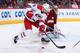 GLENDALE, AZ - DECEMBER 14: Tuomo Ruutu #15 of the Carolina Hurricanes attempts to set up for a shot on goaltender Mike Smith #41 of the Phoenix Coyotes during the thrid period of the NHL game at Jobing.com Arena on December 14, 2013 in Glendale, Arizona