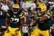 ARLINGTON, TX - DECEMBER 15: Running back Eddie Lacy #27 celebrates a fourth quarter touchdown with defensive end Mike Daniels #76 of the Green Bay Packers against the Dallas Cowboys during a game at AT&T Stadium on December 15, 2013 in Arlington, Texas.