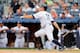 NEW YORK, NY - AUGUST 11: Brett Gardner #11 of the New York Yankees follows through on his ninth inning game winning home run against the Detroit Tigers at Yankee Stadium on August 11, 2013 in the Bronx borough of New York City. (Photo by Jim McIsaac/G