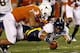 December 28, 2011, San Diego, CA: California Bears wide receiver Marvin Jones (1) attempts to recover a fumble on a kick off during the first quarter of the Holiday Bowl against Texas Longhorns linebacker Jordan Hicks (3) at Qualcomm Stadium. Mandatory Cr