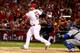 Matt Adams gets a hit during the NLCS against the Dodgers.