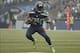 Dec 22, 2013; Seattle, WA, USA; Seattle Seahawks running back Marshawn Lynch (24) rushes against the Arizona Cardinals during the second quarter at CenturyLink Field. Mandatory Credit: Joe Nicholson-USA TODAY Sports