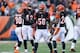 CINCINNATI, OH - DECEMBER 22: Rey Maualuga #58 of the Cincinnati Bengals celebrates with George Iloka #43 and Adam Jones #24 after intercepting a pass during the NFL game against the Minnesota Vikings at Paul Brown Stadium on December 22, 2013 in Cincin