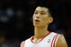 HOUSTON, TX - NOVEMBER 07: Jeremy Lin #7 of the Houston Rockets walks across the court against the Los Angeles Lakers during the game at Toyota Center on November 7, 2013 in Houston, Texas. NOTE TO USER: User expressly acknowledges and agrees that, by do