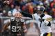 Nov 24, 2013; Cleveland, OH, USA; Pittsburgh Steelers quarterback Ben Roethlisberger (7) throws a pass against Cleveland Browns outside linebacker Jabaal Sheard (97) during the first quarter at FirstEnergy Stadium. Mandatory Credit: Ron Schwane-USA TODAY