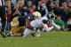 SOUTH BEND, IN - SEPTEMBER 21: Louis Nix III #1 of the Notre Dame Fighting Irish sacks Andrew Maxwell #10 of the Michigan State Spartans at Notre Dame Stadium on September 21, 2013 in South Bend, Indiana. Notre Dame defeated Michigan State 17-13. (Photo b