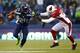 SEATTLE - DECEMBER 22: Marshawn Lynch #24 of the Seattle Seahawks runs against Patrick Peterson #21 of the Arizona Cardinals on December 22, 2013 at CenturyLink Field in Seattle, Washington. (Photo by Jonathan Ferrey/Getty Images)