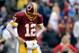 LANDOVER, MD - DECEMBER 22: Kirk Cousins #12 of the Washington Redskins reacts after a play in the first half during an NFL game against the Dallas Cowboys at FedExField on December 22, 2013 in Landover, Maryland. (Photo by Patrick McDermott/Getty Image