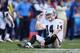 SAN DIEGO, CA - DECEMBER 22: Quarterback Matt McGloin #14 of the Oakland Raiders sits on the ground against the San Diego Chargers in the second half at Qualcomm Stadium on December 22, 2013 in San Diego, California. The Chargers defeated the Raiders 26-