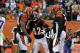 Dec 22, 2013; Cincinnati, OH, USA; Cincinnati Bengals running back BenJarvus Green-Ellis (42) is met by his teammates after running in a touchdown during the first quarter of the game against the Minnesota Vikings at Paul Brown Stadium. Mandatory Credit: