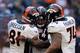 HOUSTON, TX - DECEMBER 22: Peyton Manning #18 of the Denver Broncos celebrates with Joel Dreessen #81 and Orlando Franklin #74 after Manning set the NFL record for touchdown passes in a season with 51, in a 37-13 defeat of the Houston Texans at Reliant S