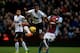BIRMINGHAM, ENGLAND - DECEMBER 15: Luis Antonio Valencia of Manchester United holds off the challenge of Christian Benteke of Aston Villa during the Barclays Premier League match between Aston Villa and Manchester United at Villa Park on December 15, 201