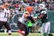 Dec 22, 2013; East Rutherford, NJ, USA; Cleveland Browns quarterback Jason Campbell (17) throws a pass while New York Jets outside linebacker Quinton Coples (98) rushes during the first half at MetLife Stadium. Mandatory Credit: Ed Mulholland-USA TODAY Sp