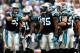 CHARLOTTE, NC - DECEMBER 22: Luke Kuechly #59 of the Carolina Panthers huddles with the defense during their game against the New Orleans Saints at Bank of America Stadium on December 22, 2013 in Charlotte, North Carolina. (Photo by Streeter Lecka/Gett