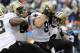 Dec 22, 2013; Charlotte, NC, USA; New Orleans Saints tight end Jimmy Graham (80) celebrates with wide receiver Kenny Stills (84) after scoring a touchdown in the fourth quarter during the game against the Carolina Panthers at Bank of America Stadium. Pant