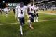 PHILADELPHIA, PA - DECEMBER 22: Jay Cutler #6 of the Chicago Bears walks off of the field with Jordan Mills #67 following the game against the Philadelphia Eagles at Lincoln Financial Field on December 22, 2013 in Philadelphia, Pennsylvania. The Eagles d