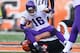 CINCINNATI, OH - DECEMBER 22: Matt Cassel #16 the Minnesota Vikings is tackled by Domata Peko #94 of the Cincinnati Bengals during the NFL game at Paul Brown Stadium on December 22, 2013 in Cincinnati, Ohio. (Photo by Andy Lyons/Getty Images)