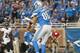 DETROIT, MI - DECEMBER 16: Tight end Joseph Fauria #80 of the Detroit Lions catches a touchdown under pressure from inside linebacker Daryl Smith #51 of the Baltimore Ravens during the second half at Ford Field on December 16, 2013 in Detroit, Michigan. T