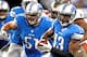 DETROIT, MI - NOVEMBER 24: Nate Burleson #13 of the Detroit Lions heads up field with teammate Dominic Raiola #51 of the Detroit Lions against the Tampa Bay Buccaneers at Ford Field on November 24, 2013 in Detroit, Michigan. (Photo by Gregory Shamus/Getty