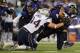BALTIMORE, MD - DECEMBER 22: Running back Ray Rice #27 of the Baltimore Ravens is tackled by defensive tackle Chris Jones #94 of the New England Patriots in third quarter at M&T Bank Stadium on December 22, 2013 in Baltimore, Maryland. The New England Pat