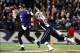Dec 22, 2013; Baltimore, MD, USA; Baltimore Ravens quarterback Joe Flacco (5) throws the ball while being pressured by New England Patriots defensive end Chandler Jones (95) at M&T Bank Stadium. Mandatory Credit: Evan Habeeb-USA TODAY Sports