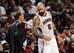 Dec 23, 2013; Miami, FL, USA; Atlanta Hawks head coach Mike Budenholzer (left) talks with center Pero Antic (right) during the second half against the Miami Heat at American Airlines Arena. The Heat won 121-119 in overtime. Mandatory Credit: Steve Mitchel