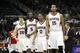 Dec 20, 2013; Atlanta, GA, USA; Atlanta Hawks shooting guard Kyle Korver (26) and small forward DeMarre Carroll (5) and point guard Jeff Teague (0) and center Al Horford (15) walk on the court against the Utah Jazz in the third quarter at Philips Arena. M