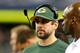 ARLINGTON, TX - DECEMBER 15: Quarterback Aaron Rodgers #12 of the Green Bay Packers looks on from the sideline during a game against the Dallas Cowboys at AT&T Stadium on December 15, 2013 in Arlington, Texas. (Photo by Ronald Martinez/Getty Images)