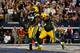 ARLINGTON, TX - DECEMBER 15: Running back Eddie Lacy #27 celebrates a fourth quarter touchdown with defensive end Mike Daniels #76 of the Green Bay Packers against the Dallas Cowboys during a game at AT&T Stadium on December 15, 2013 in Arlington, Texas.