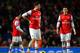 LONDON, ENGLAND - DECEMBER 08: A dejected Olivier Giroud and Mesut Oezil of Arsenal prepare to restart after Gerard Deulofeu of Everton (not pictured) equalised during the Barclays Premier League match between Arsenal and Everton at Emirates Stadium on D