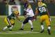 GREEN BAY, WI - NOVEMBER 04: Martellus Bennett #83 of the Chicago Bears moves against Casey Hayward #29 and Brad Jones #59 of the Green Bay Packers at Lambeau Field on November 4, 2013 in Green Bay, Wisconsin. The Bears defeated the Packers 27-20. (Photo