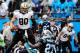 CHARLOTTE, NC - DECEMBER 22: Jimmy Graham #80 of the New Orleans Saints has words for Quintin Mikell #27 of the Carolina Panthers after beating him for a touchdown during their game at Bank of America Stadium on December 22, 2013 in Charlotte, North Caro