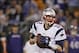 Dec 22, 2013; Baltimore, MD, USA; New England Patriots quarterback Tom Brady (12) drops back to pass against the Baltimore Ravens at M&T Bank Stadium. Mandatory Credit: Mitch Stringer-USA TODAY Sports