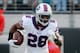 JACKSONVILLE, FL - DECEMBER 15: C.J. Spiller #28 of the Buffalo Bills runs for yardage during the game against the Jacksonville Jaguars at EverBank Field on December 15, 2013 in Jacksonville, Florida. (Photo by Sam Greenwood/Getty Images)