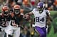 Dec 22, 2013; Cincinnati, OH, USA; Minnesota Vikings wide receiver Cordarrelle Patterson (84) runs the ball past Cincinnati Bengals free safety Reggie Nelson (20) and linebacker Jayson DiManche (51) in the third quarter of the game at Paul Brown Stadium.