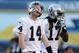 SAN DIEGO, CA - DECEMBER 22: Quarterback Matt McGloin #14 and Denarius Moore #17 of the Oakland Raiders walk off the field in the second half against the San Diego Chargers at Qualcomm Stadium on December 22, 2013 in San Diego, California. The Chargers d
