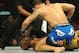 Jul 6, 2013; Las Vegas, NV, USA; Chris Weidman, blue shorts, defeated Anderson Silva (yellow shorts) in their Middleweight Chamionship Bout in the second round with a TKO at the MGM Grand Garden Arena. Mandatory Credit: Jayne Kamin-Oncea-USA TODAY Sports