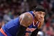 PORTLAND, OR - NOVEMBER 25: Carmelo Anthony #7 of the New York Knicks looks on during the game against the Portland Trail Blazers on November 25, 2013 at the Moda Center Arena in Portland, Oregon. NOTE TO USER: User expressly acknowledges and agrees that